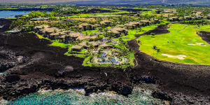Aerial view of Halii Kai and Pacific coastline